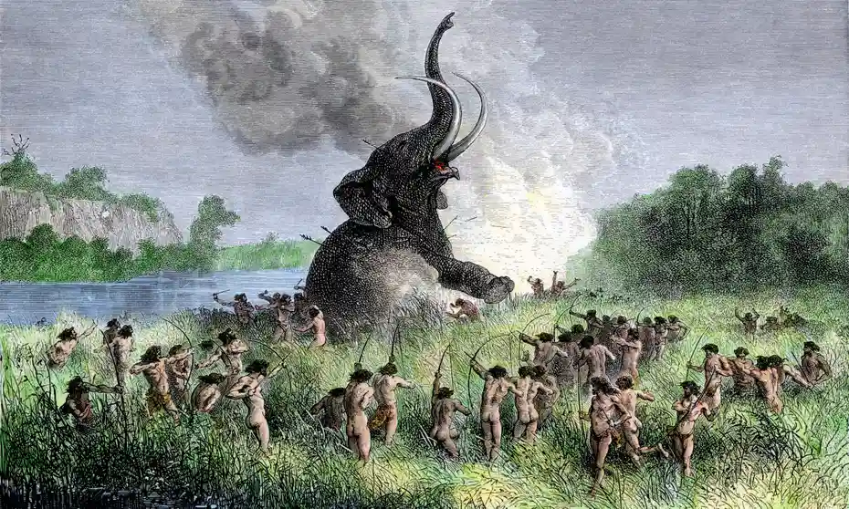 Primitive humans hunting during the Stone Age.